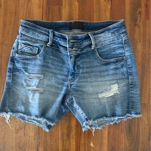 Buckle black jean shorts